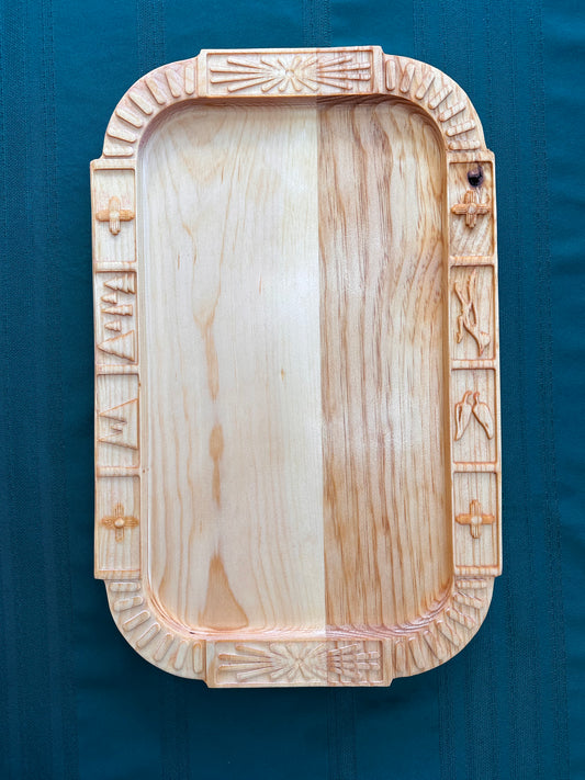 Even though this board is made from two pieces of pine glued together, the two pieces have such diverse textures it makes this tray have a very interesting design.
