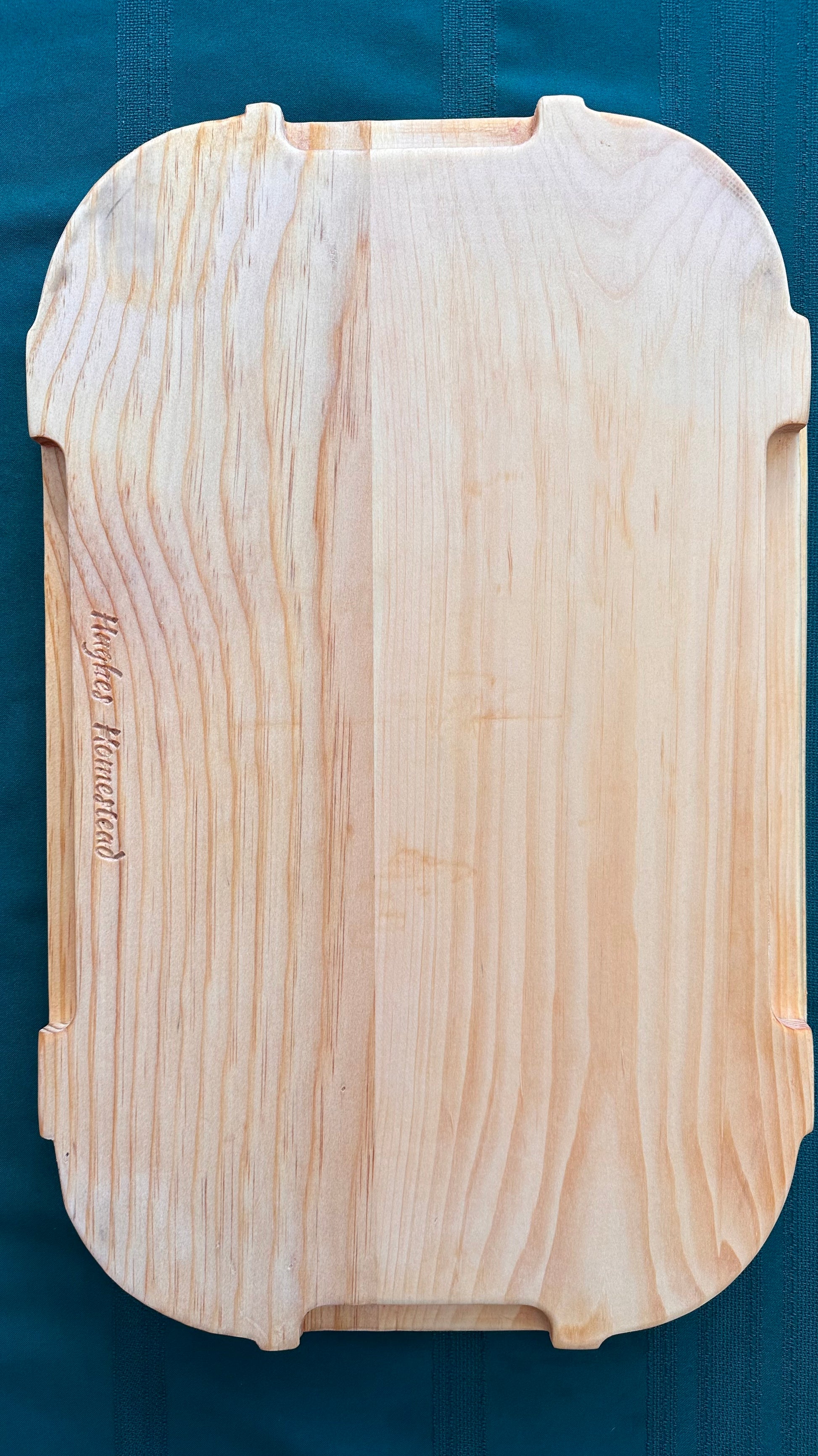 The back of the board displaying the handles on every side.
